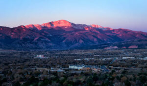 Sunrise on Pikes Peak above Colorado Springs, Colorado | Cobb Team